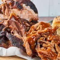 BBQ Pulled Pork · Smoked slowly in our wood smoker and tossed with smokey mama BBQ sauce. We cannot make subst...