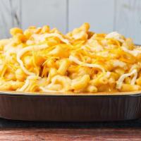 The Classic Mac · Our blend of cheddar and American cheese tossed with elbow mac. Vegetarian. Contains gluten,...