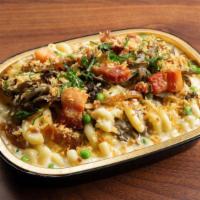 Parisian Truffle Mac · Inside you will find mushrooms, bacon, caramelized onions, and black truffle. Topped with ga...