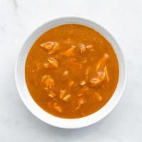 Chicken Tortilla Soup · A pureed, tortilla thickened soup of tomatoes, roasted tomatillos, green chiles, garlic, cel...