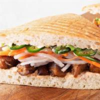Mendo's Original Pork Belly Banh Mi · Our Chef’s playful take on the popular Vietnamese sandwich with braised, caramelized pork be...