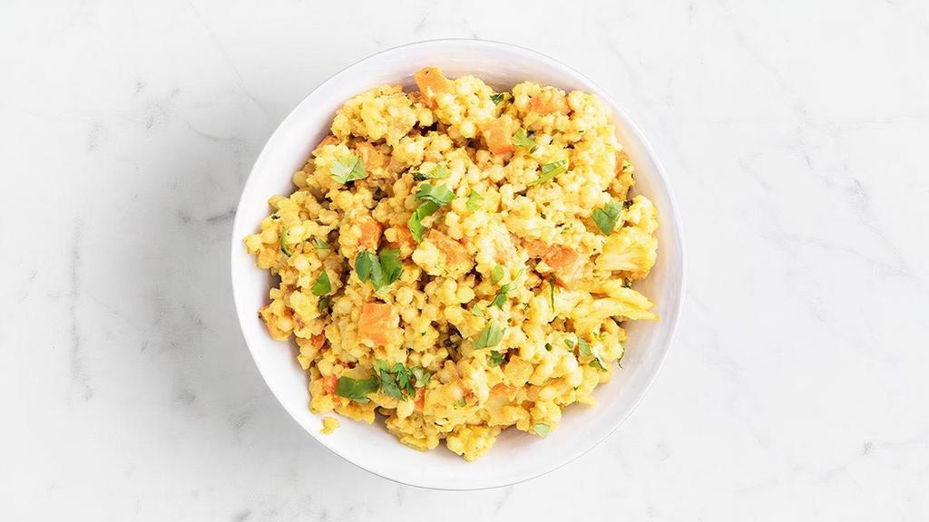Spicy Curried Couscous  · roasted cauliflower & carrots with Mendo's signature spice mix. vegan