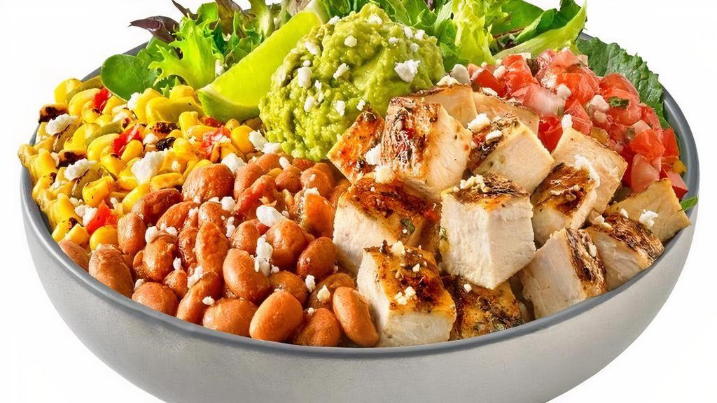 Campero Bowl · Our freshest flavors remixed into a new classic. Each bowl contains Campero rice, Campero beans*, spring mix, roasted corn & peppers, pico de gallo, smashed avocado, feta cheese, a lime wedge, and your choice of fried or grilled chicken.. *Contains pork