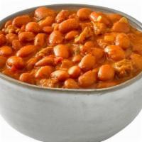 Campero Beans · Slowly Cooked Pinto Beans. Made with Chorizo, Onions, Garlic, Diced Tomato, Cilantro and Jal...