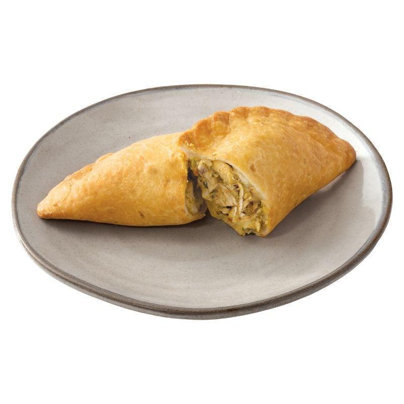 Individual Empanada · Handmade daily and packed with our signature chicken.