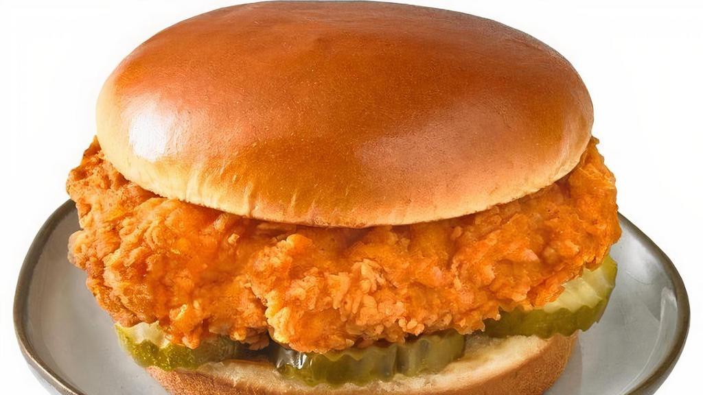 Fried Sandwich Only · Try the all new fried chicken sandwich! Hand breaded with our traditional seasoning. The 100% white meat breast filet is then laid on top of three sweet pickles and served with a soft buttered brioche bun