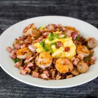 Aaron's Fried Rice · Shrimp (three), Ham, Bacon, Pork Sausage & Green Onions topped with 2 Scrambled Eggs. Comes ...