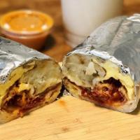 La Bonita Breakfast Burrito · Two eggs, cheese, bacon, hash brown and salsa fresca wrapped in a flour tortilla.