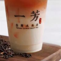 Black Tea Latte 紅茶鮮奶 · Yifang's version of Taiwanese milk tea with Clover organic milk. Highly recommend adding pea...