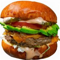 Avocado Burger · Avocado, Impossible patty, vegan cheese, grilled onions, 1000 island, pickles, tomato on an ...