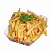 Garlic Cilantro Fries · Shoestring fries tossed with minced garlic, fresh cilantro, salt and pepper