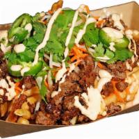 Banh Mi Loaded Fries · Sesame soy glazed Impossible, carrots and daikon piclkes, jalapenos, cilantro, and sriracha ...