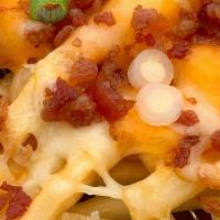 Bacon & Cheese  · House made fries topped with applewood smoked bacon, sharp cheddar cheese & sour cream.