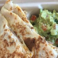 Quesadillas · Two 10' tortillas filled with cheese and beef steak, then grilled to perfection.  Served wit...