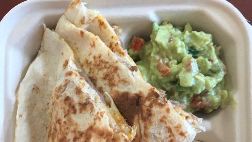 Quesadillas · Two 10' tortillas filled with cheese and beef steak, then grilled to perfection.  Served with guacamole and sour cream, served with guacamole and sour cream.