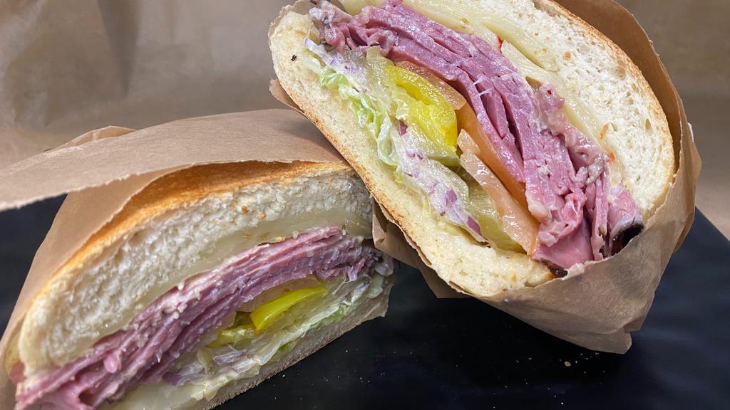 California Pastrami · California Pastrami sandwich put on your choice of toasted bread with your choice of cheese. Topped with lettuce, tomato, olives, jalepeños, banana peppers, pickles, mayonnaise, and mustard.