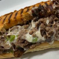 Phily Cheese Steak · Beef steak, bell pepper, onions, mushrooms, mayo and cheese.