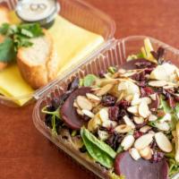 House Salad · mixt greens, red beets, sliced almonds, artichoke.