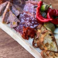 small salumi · chef’s selection of cured meats, cheeses, taralli, and house-made pickles.