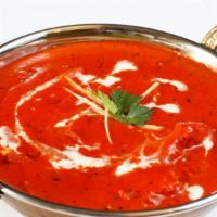 Butter Chicken · Fresh sliced chicken breast, tomato sauce, and a slew of aromatic spices.