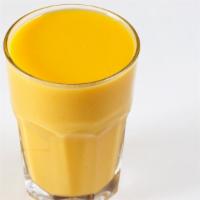 Mango Lassi · Fresh mango flavored drink.
