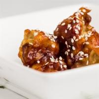 Honey Cauliflower · Crisped cauliflower coated with spicy indo-Chinese sauce.