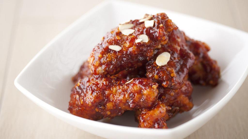Chicken Wings (7pcs) · Contains almonds. Choose sweet and tangy chili or soy garlic sauce.
