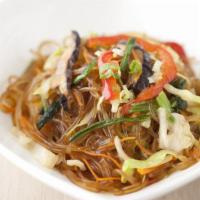 Veggie Jhap Chae (A) · Stir-fried glass noodles (sweet potato noodles), mushrooms, julienned carrots, onion, spinac...