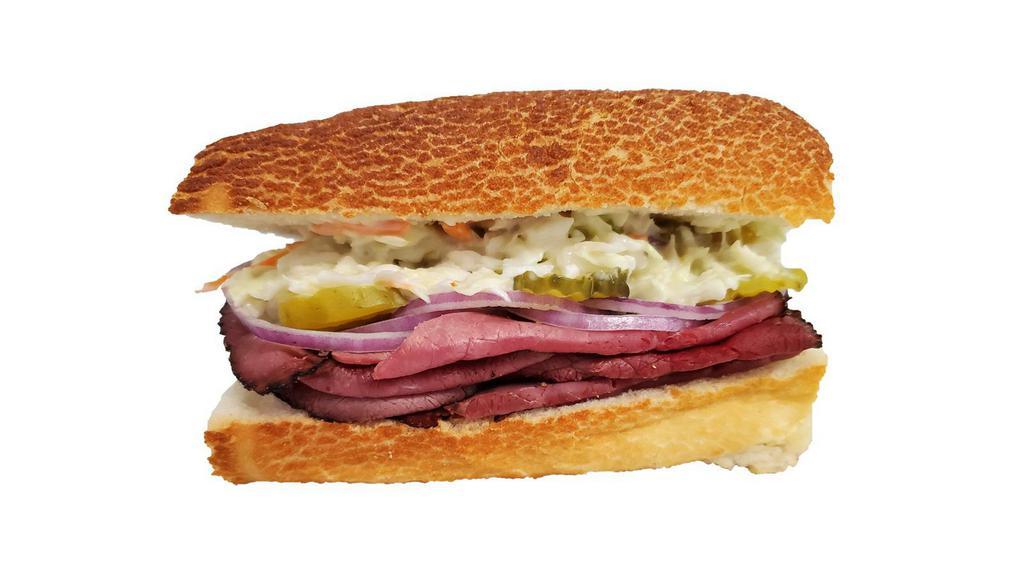 Hot Pastrami Sandwich · Hot Pastrami Sandwich:
Pastrami, Swiss Cheese, Mayonnaise, Stoneground Mustard, Sliced Red Onion, Pickles, Coleslaw