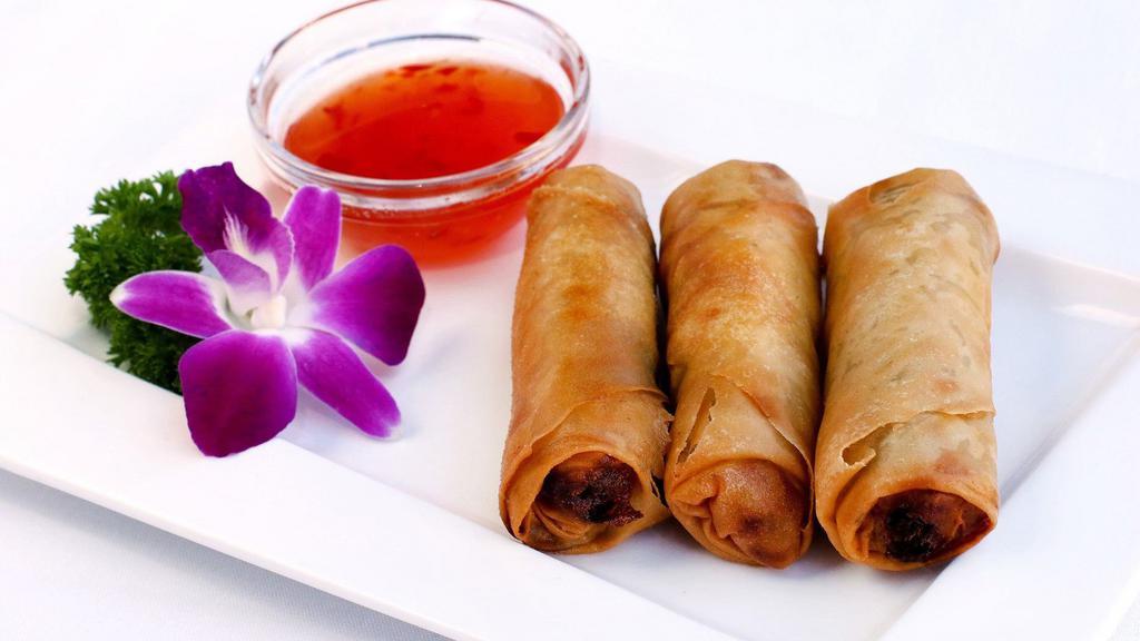 Imperial Rolls · Deep fried rolls wrapped with ground chicken, prawns, cabbage, mushroom and bean thread noodles.