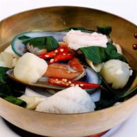 Po Tak · Spicy and sour soup with combination of seafood (prawns, scallops, calamari, fish and green ...