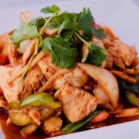 Pad Prig Pao · Choice of chicken or pork sautéed with baby corn, bamboo shoots, mushrooms, bell peppers, an...