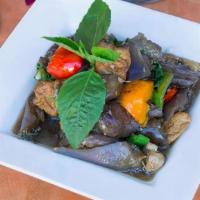 Spicy Ma Kuer · Sautéed eggplant with mushrooms, fried tofu, baby corn, bell pepper, chili, garlic, and Thai...