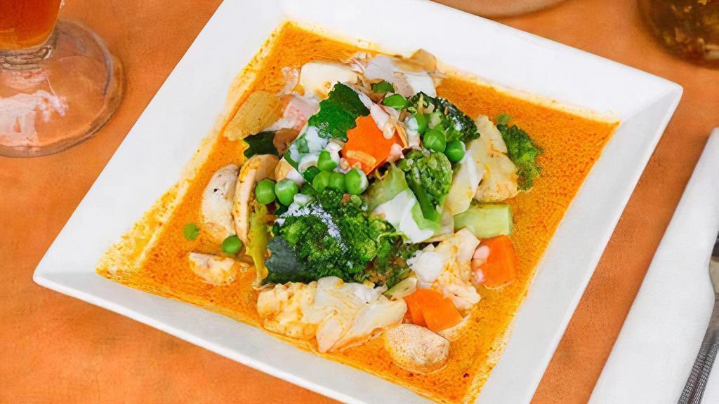 Mixed Vegetable Curry · Mixed vegetables, mushrooms, baby corn and tofu cooked in yellow, red or green curry sauce.