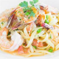 Fettuccine · With sautéed prawns, garlic, green onions, diced tomatoes and extra virgin olive oil.