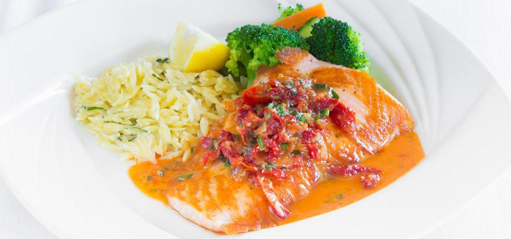 Grilled King Salmon · With chardonnay wine-sun dried tomatoes sauce and basil orzo.