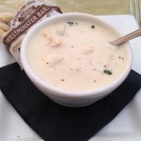 New England Clam Chowder · A blend of tender sweet whole clams, clam broth, fresh cream, natural cut potatoes, and roux...
