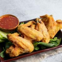 Tamarind Wings · Fried chicken wings (4) served with spicy tamarind sauce