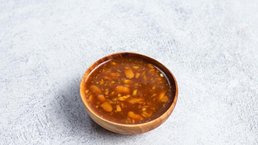 Cluck Sauce · Traditional chicken and rice sauce (soy bean paste, ginger, garlic)