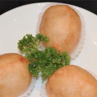 鹹水角/Fried pork dumplings · Fried pork dumplings