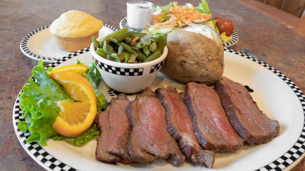 Santa Maria Tri-Tip Dinner* · 10 oz of marinated tri-tip seasoned with a Santa Maria blend of spices including garlic, cracked black pepper, salt and fresh parsley.