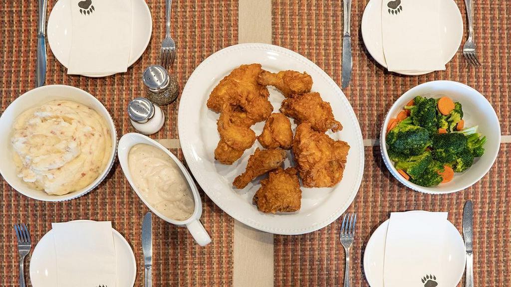 Fried Chicken Family Meal · 8 pieces of bone-in fried chicken (legs, thighs, wings & breasts) served with your choice of 2 dinner sides.