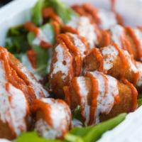 Happy Nuggets  (NF) · Crispy nuggets on top of spring mix. Served with ketchup, ranch, bbq sauce, buffalo sauce, o...