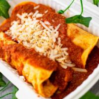 Enchiladas with Mozzerella (GF/NF) · Three corn tortillas filled with jackfruit carnitas, topped with house enchilada sauce and m...