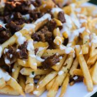 Bacon Ranch Cheese Fries · Fries smothered in cheese sauce, ranch dressing, and soy-bacon.