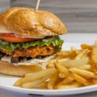 Buffalo Chicken BLT · Breaded soy chick'n patty tossed in buffalo sauce, bacon, lettuce, tomato, and ranch on a to...