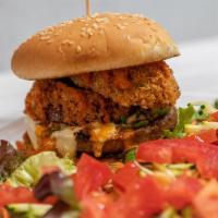 Red Rooster Burger · Vegan patty topped with nacho jalapenos, mozzarella, lettuce, onion rings, spicy sauce, and ...