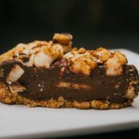 Smores Pie (NF) · Chocolate Ganache pie loaded with graham crackers and vegan marshmellows