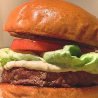 The Ba Burger · lettuce, tomato, onion, BA secret sauce,  and pickles on a brioche bun.