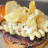 Truffle Mac & Cheese Burger · truffle mac & cheese, beef patty and ranch drizzle on a pretzel bun